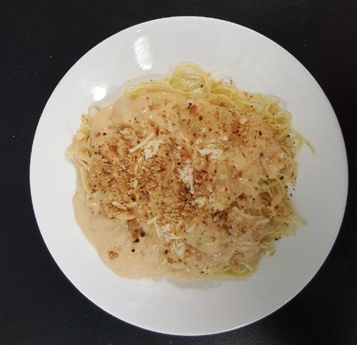 scallops au gratin over pasta